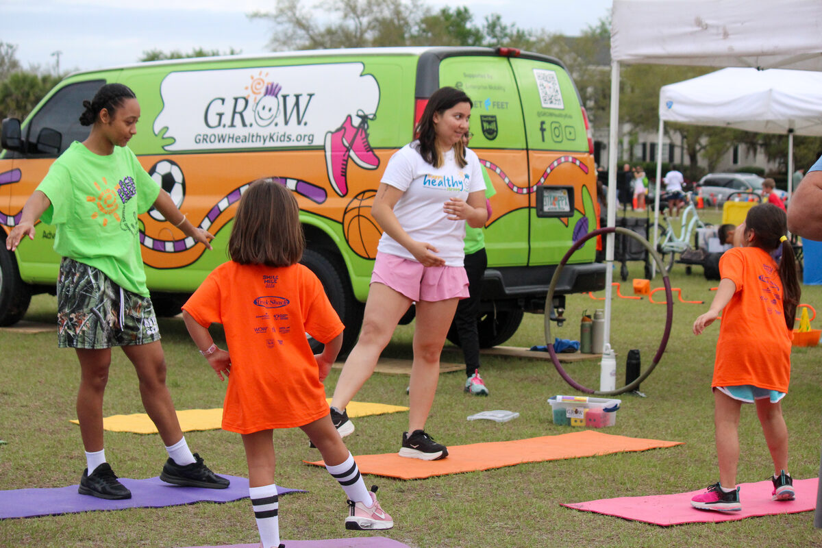 Kids running at GROW event